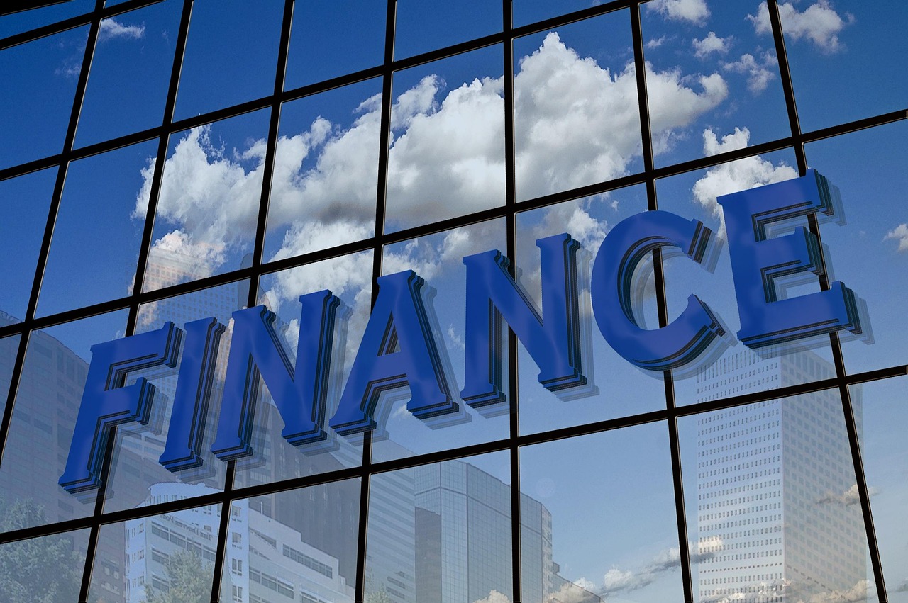 Finance, facade, reflection — CFD Trading 101: A Beginner's Guide to Contracts for Difference