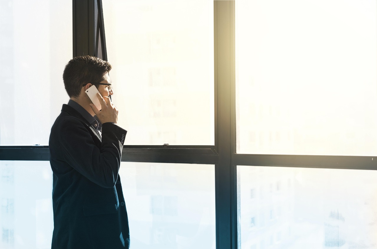 Man, cell phone, tuxedo — How Are Professional Asbestos Attorneys Beneficial for Victims?