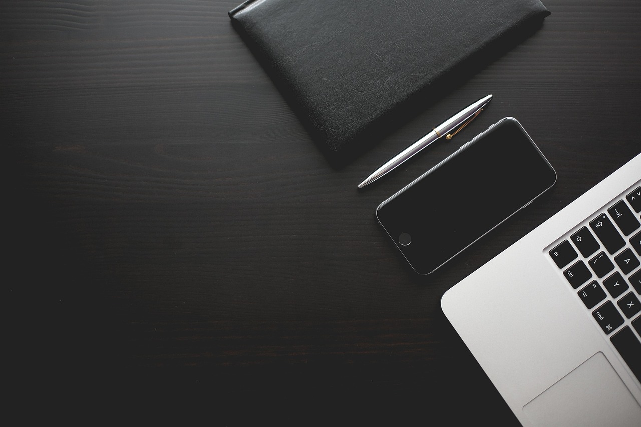 Office, desk, smartphone — How Indian Professionals Can Apply for Hong Kong QMAS?