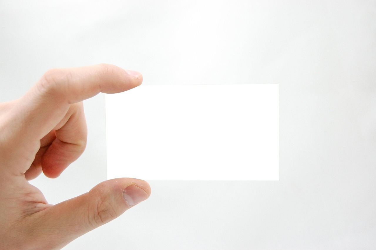 Business card, business, hand — Necessary Things To Consider While Having Dental Marketing Agency